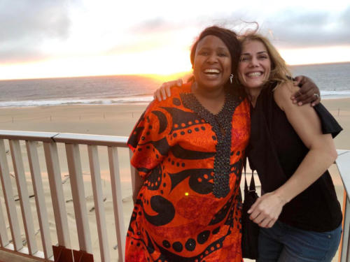 Bulelwa Ntshingwa (Fund Principal) & Helga De Vasconcelos(Singular Systems CFO), sharing a sundowners moment at Pelican Point Lodge on Namibias skeleton coast. 