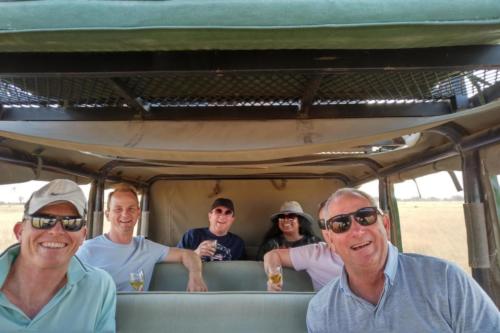 Ian Dry, Philip Hayes (Laser Group) & Peter Hammond (pilot) with Guy & Buli from PAPE before a Safari drive on their trip to San Camp